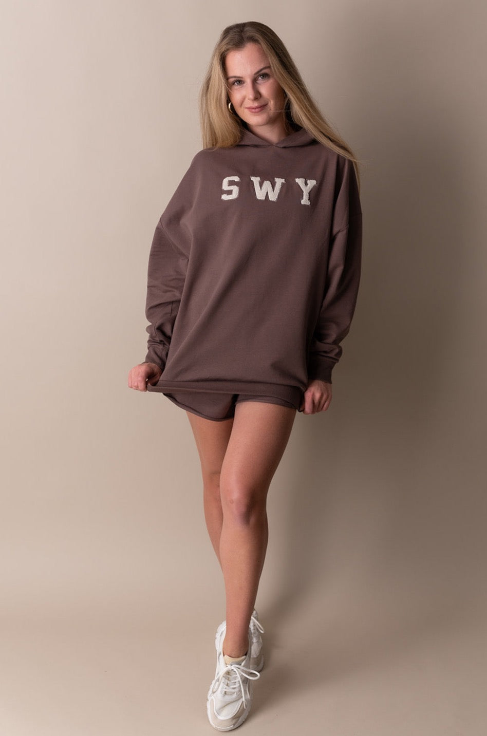 Swybrand hoodie in brown colour slightly oversized in comfy material for casual wear