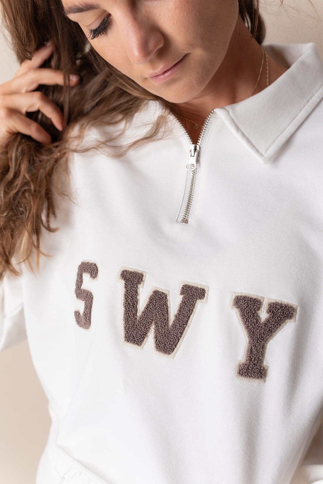 Swy comfortable long sleeve Cheer crop top in white color soft material designed to match the Swy cheer shorts